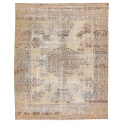 Handmade Antique Kerman Persian Wool Rug with Tan Field