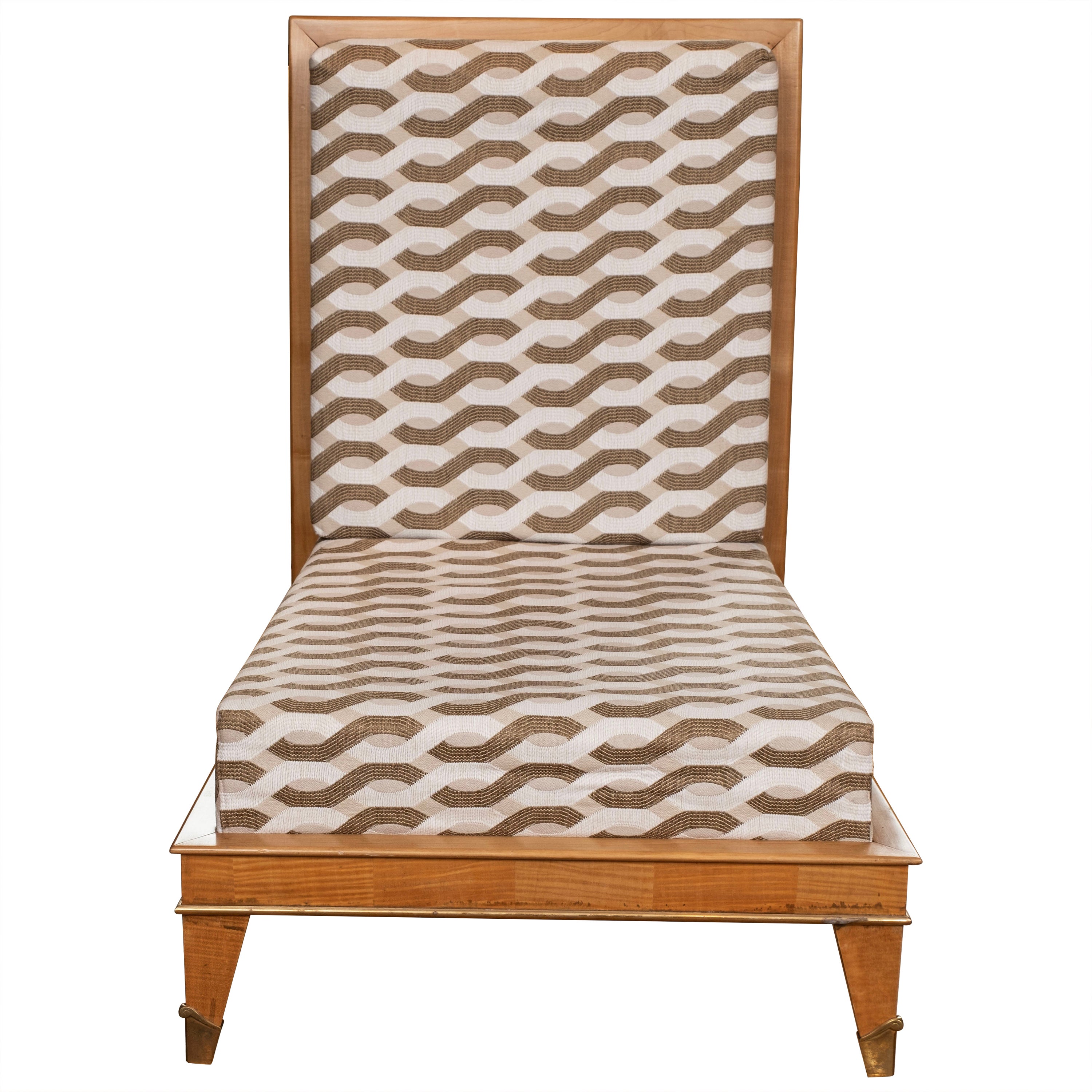 French modern chair attributed to Maurice Jallot.
This French Art Deco or French Art Moderne chair, side chair, chauffeuse or slipper chair is made of sycamore and newly upholstered in a beautiful
geometric print. Our chic sculptural chair