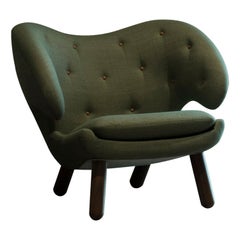 Finn Juhl - Fauteuil pélican en tissu avec boutons et bois