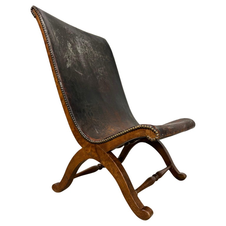 Pierre Lottier Leather and Oak Fireside Chair For Sale at 1stDibs
