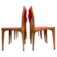 Ensemble de 6 chaises conçues par Carlo de Carli pour Cassina, en noyer et vinyle rouge 