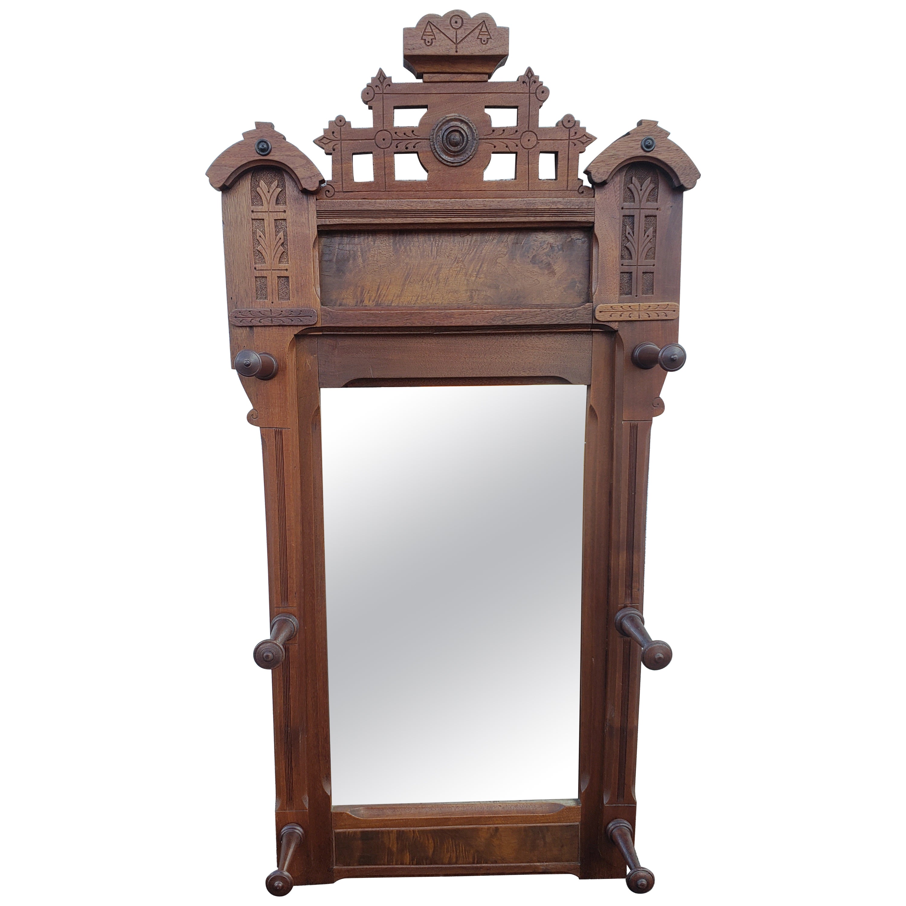  1880s Eastlake Walnut Wall Mirror with Hats Pegs For Sale
