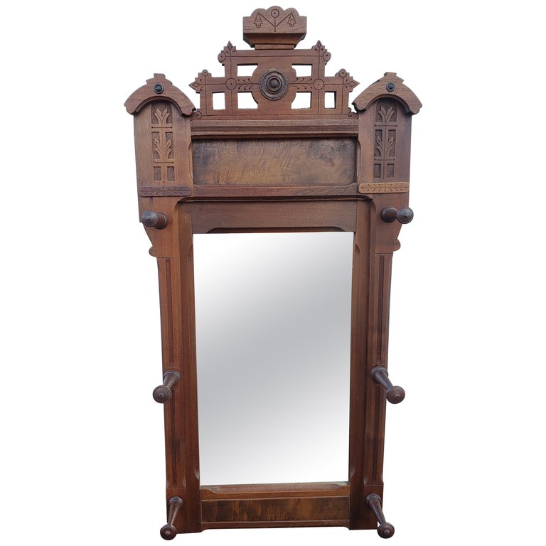 1880s Eastlake Walnut Wall Mirror with Hats Pegs For Sale at 1stDibs