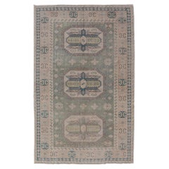 Turkish Vintage Tribal Medallion Oushak in Muted Green, Blue, and Cream