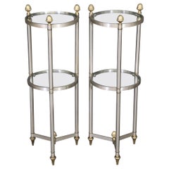 Seltenes Paar zylindrische Metall-Messing-Glas-Beistelltische im Maison-Stil mit zwei Etagen