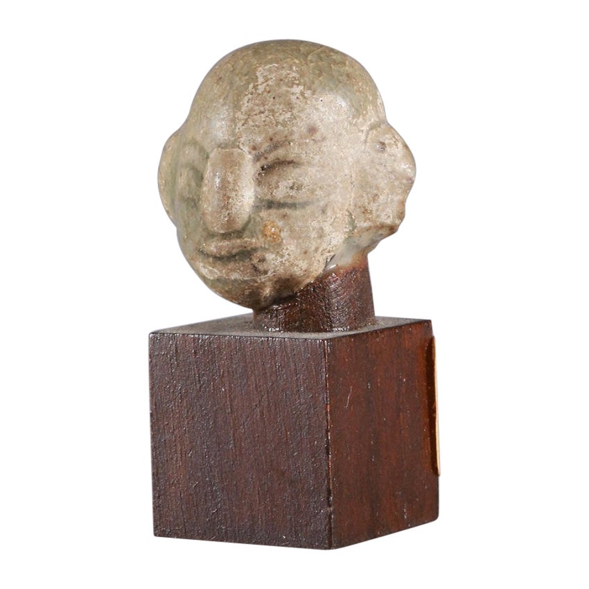 Miniature Head Made of Ceramics on Wooden Base, Cambodia, 20th Century For Sale