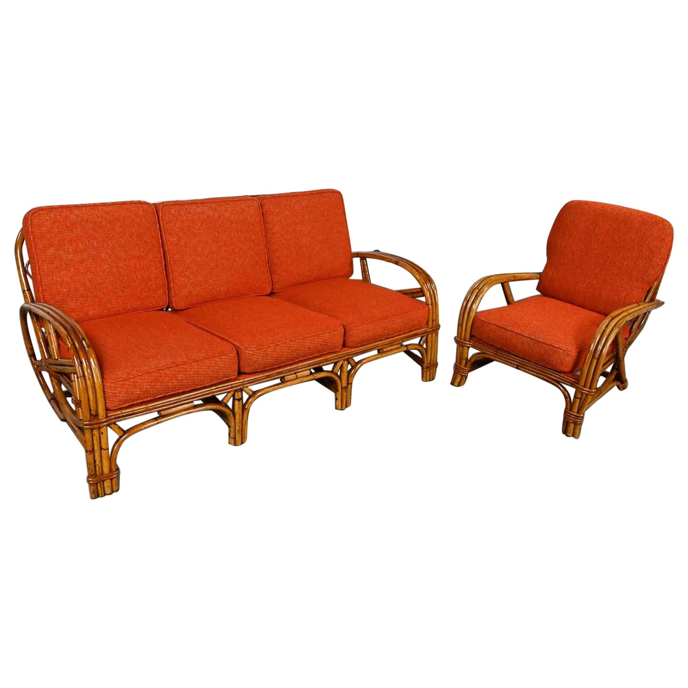 Canapé et chaise en rotin à trois brins et coussins en tissu orange style Heywood Wakefield en vente