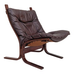 Années 1960, chaise norvégienne vintage Siesta par Ingmar Relling, cuir et bois courbé.