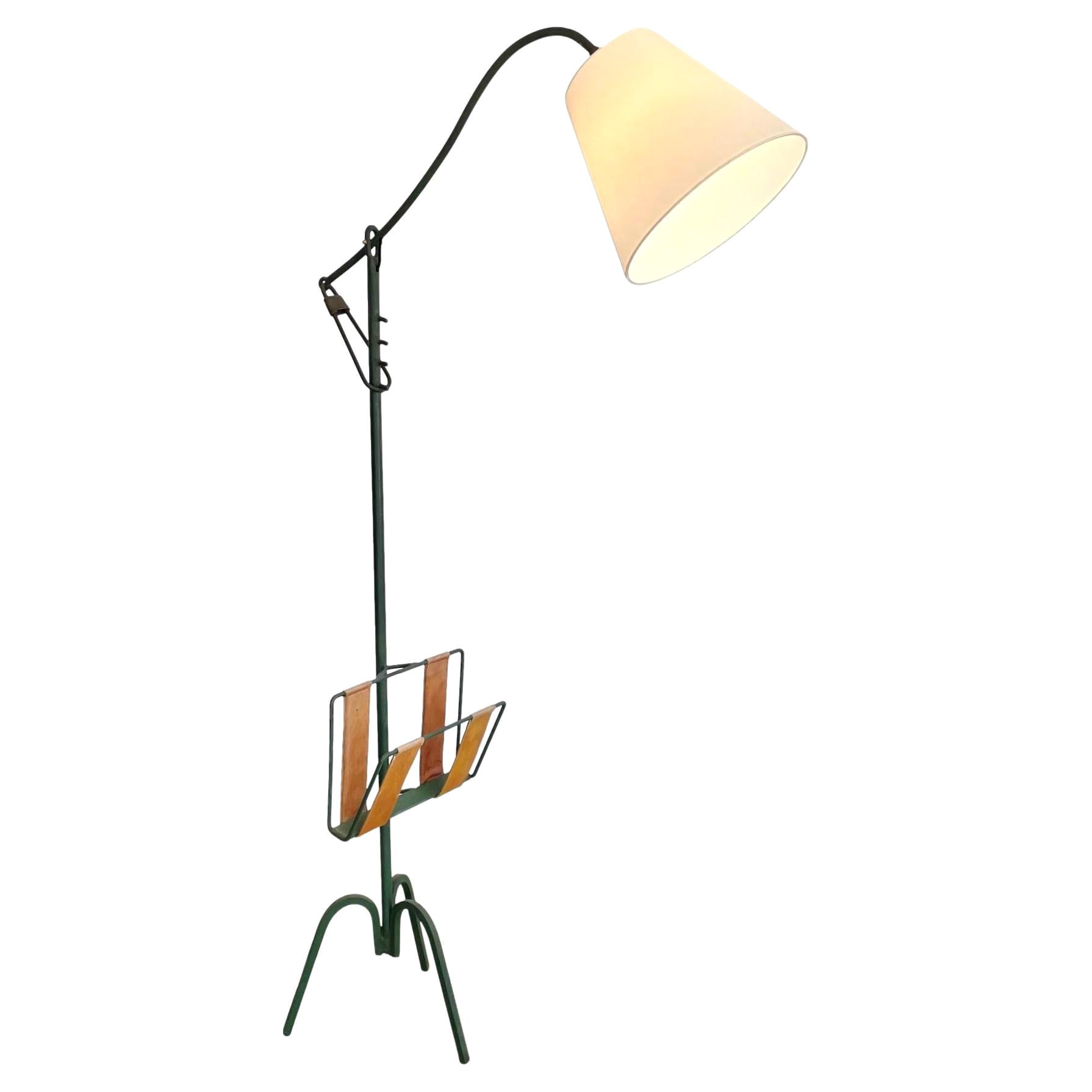 Adjustable Iron Floor Lamp in the style of Jacques Adnet, 1950s France For Sale