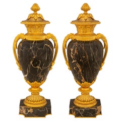 Pair Of French 19th Louis XVI St. Ormolu And Portoro Marble Lidded Urns