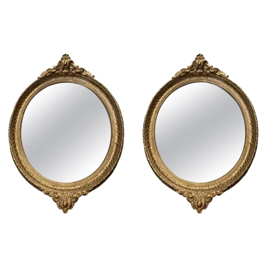 Lovely French Vintage Pair of Gold Giltwood Oval Mirrors For Sale