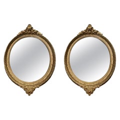 Lovely French Vintage Pair of Gold Giltwood Oval Mirrors