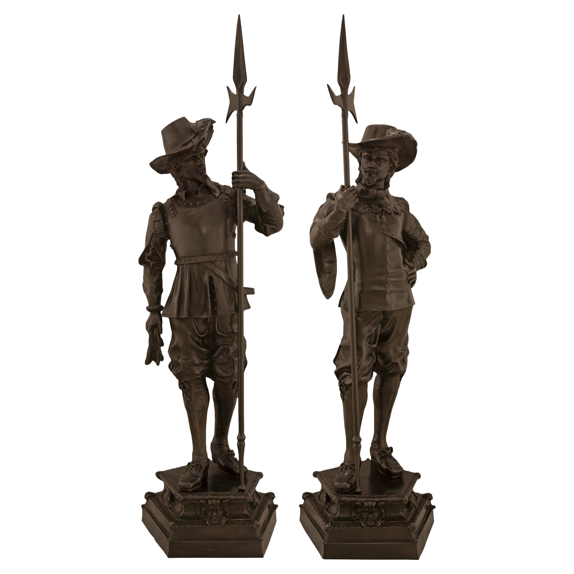 Verdadero par de estatuas de soldados franceses del siglo XIX en bronce San Luis XVI
