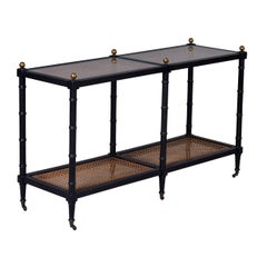 Mid-Century, Black Faux Bamboo and Caning Two Tier Console on Casters 