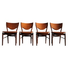 Finn Juhl BO 63 Chaises de salle à manger en teck sculpté et cuir de chèvre cognac, années 1950