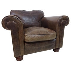 Fabuleux fauteuil en cuir brun aniline vieilli
