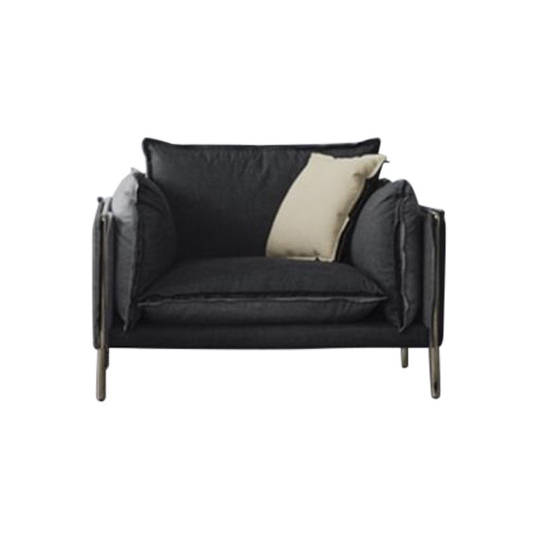 A pioneering and zen piece of furniture to suit your ever-changing moods. This deep and enveloping armchair is upholstered in two completely contrasting colours giving it a fully reversible and harmonious appeal. Available in a charcoal grey set and