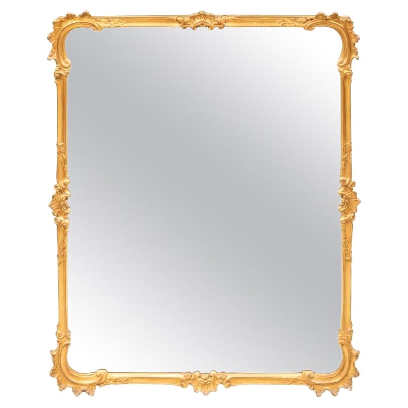 Regence Style Gilt Mirror with Beveled Detail