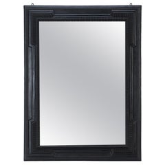 A Large Dutch style ebonIzed frame with ripple carving. Circa 1940.