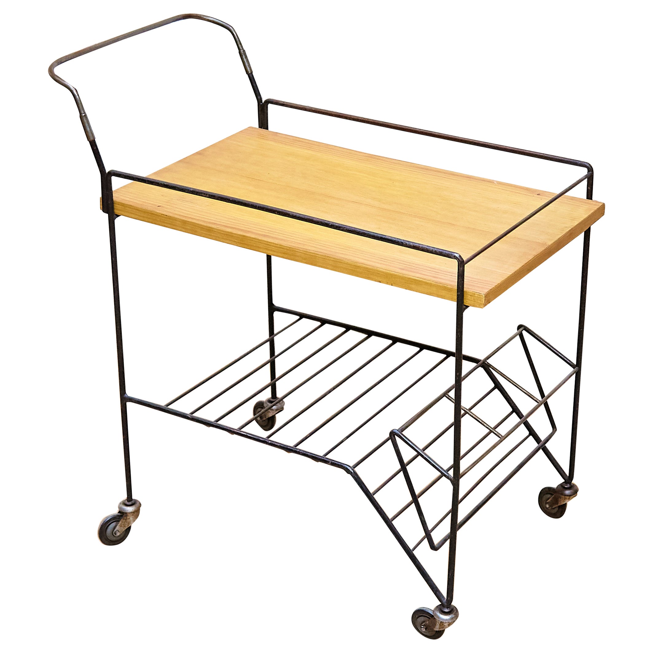 Mid-Century iron and wood trolley designed in the style of Mathieu Mategot.

Manufactured in France, circa 1960.

In good original condition, with consistent with age and use, preserving a beautiful patina with some scratches.

Dimensions: 
D 45 cm