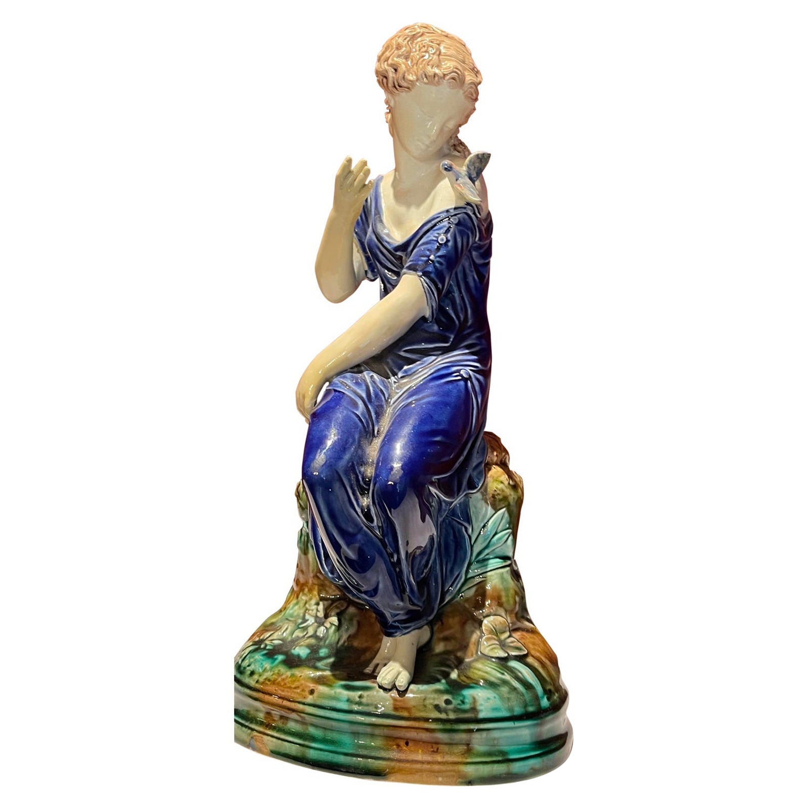 Continental Majolica Pottery Figure of a Lady and Bird, 19th Century For Sale