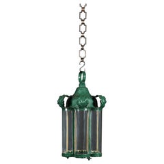 A 19th Century French Green Tole Lantern with Curved Glass