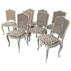 Eight Louis XV Style Cane Back Dining Chairs with Slip Seats