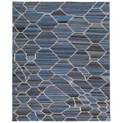 Tapis Kilim moderne et géométrique en laine tissée à plat en bleu