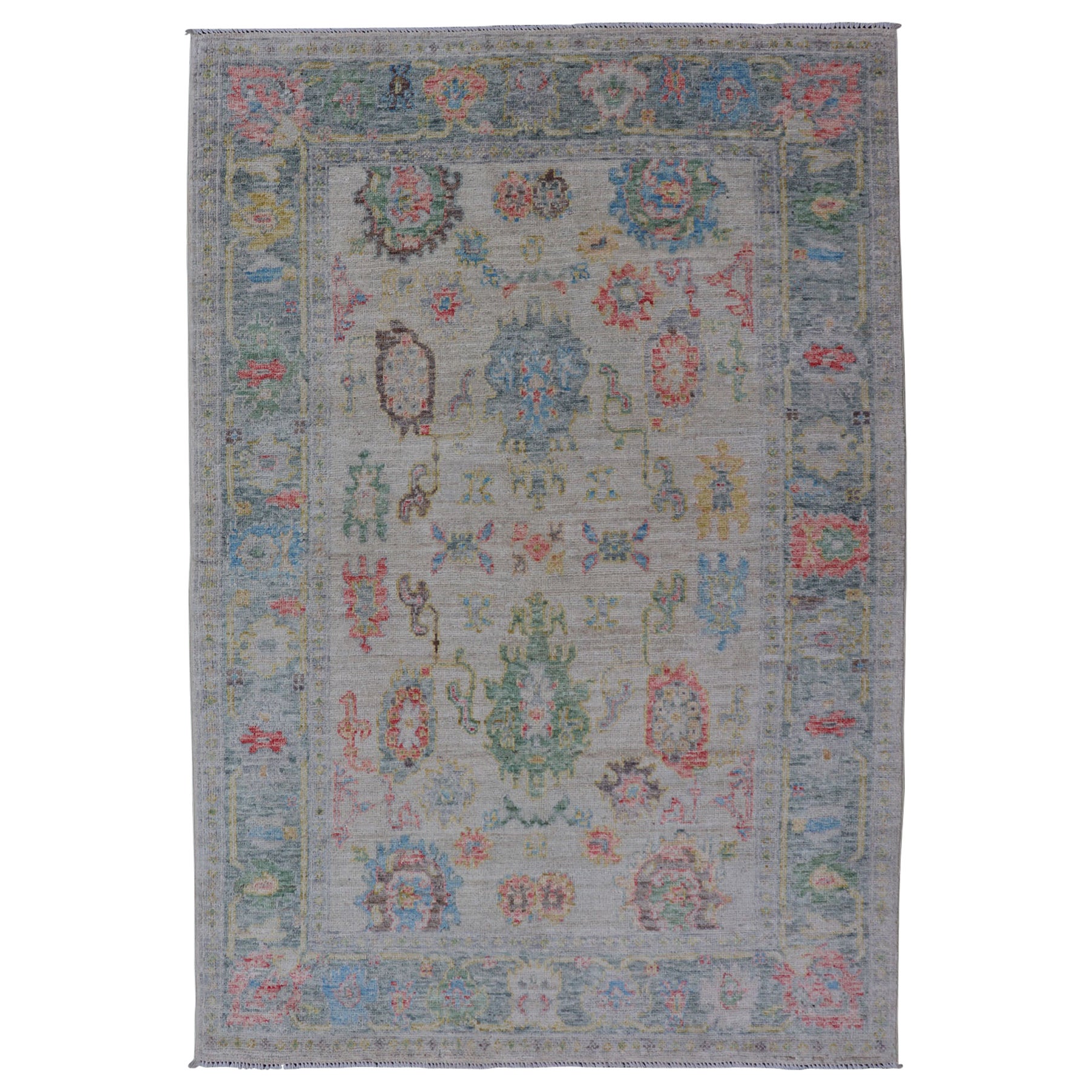 Modern All-Over Floral Oushak with Muted Background and Accent Colors For Sale