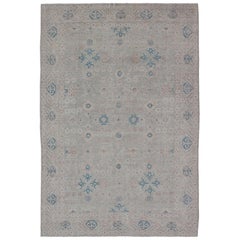 Modern All-Over Modern Khotan Rug with Light Background and Blue Colors