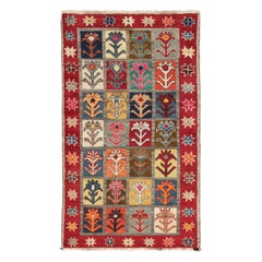 Vintage Persian Tribal Rug with Vibrant Geometric-Floral Patterns