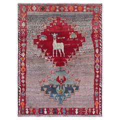 Vintage Qashqai Persian Gabbeh Rug with Medallion and Pictorial by Rug & Kilim