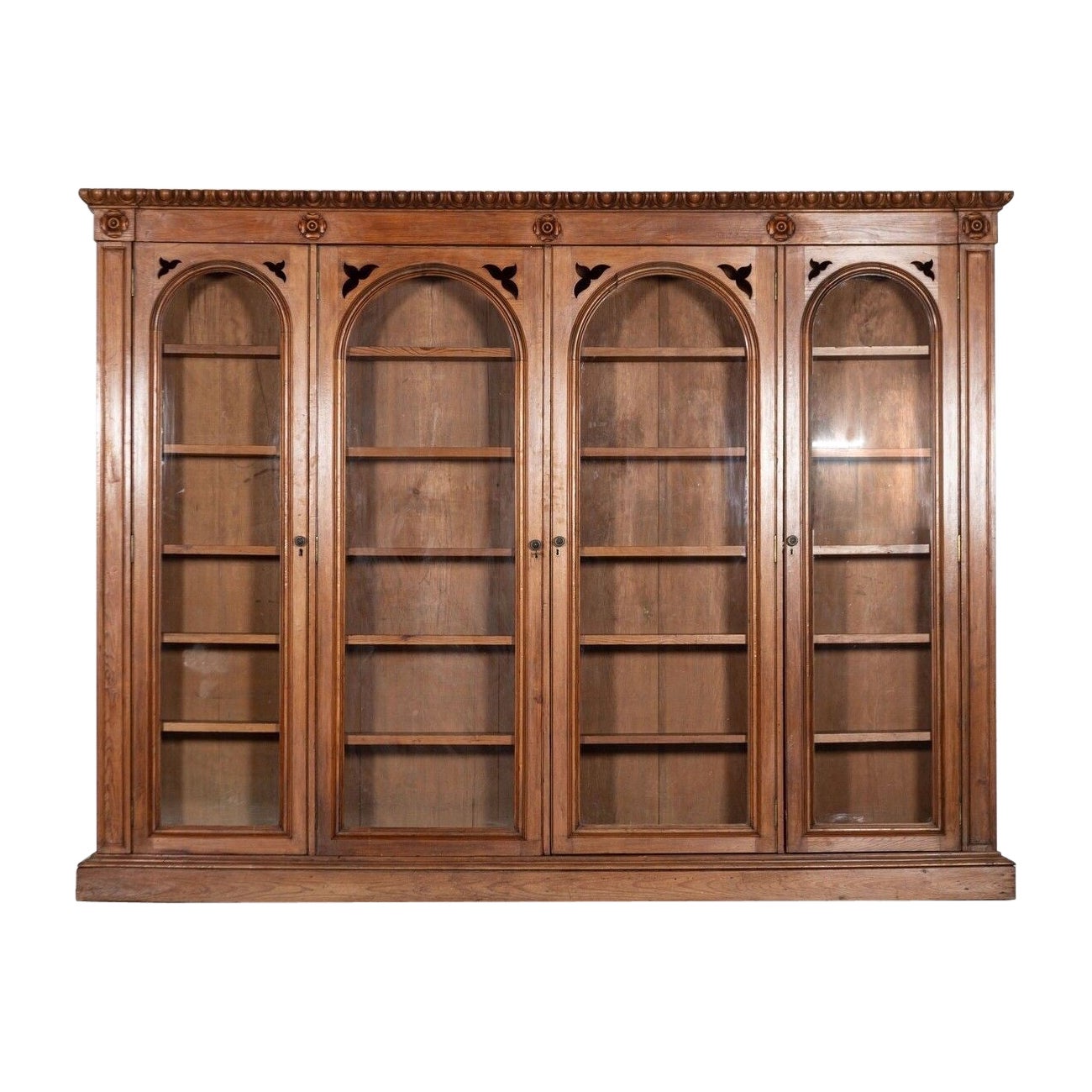 Monumental 19th Century English Pine Arched Glazed Bookcase For Sale