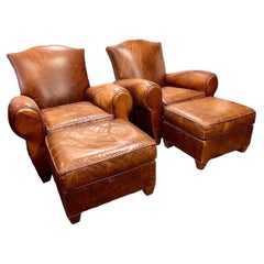 Pair of Vintage French Leather Cigar Club Chairs and Matching Ottomans
