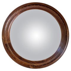 Miroir convexe vintage en noyer. États-Unis, c. 1980