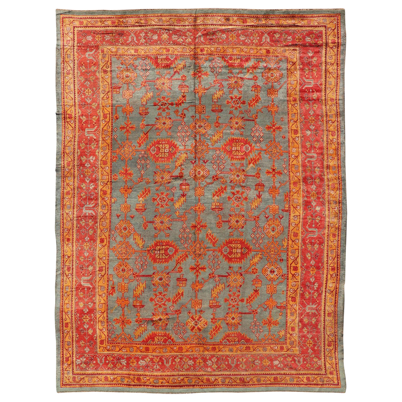 Early 20th Century Antique Turkish Oushak Rug with Flowers and Geometric  For Sale