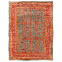 Early 20th Century Antique Turkish Oushak Rug with Flowers and Geometric