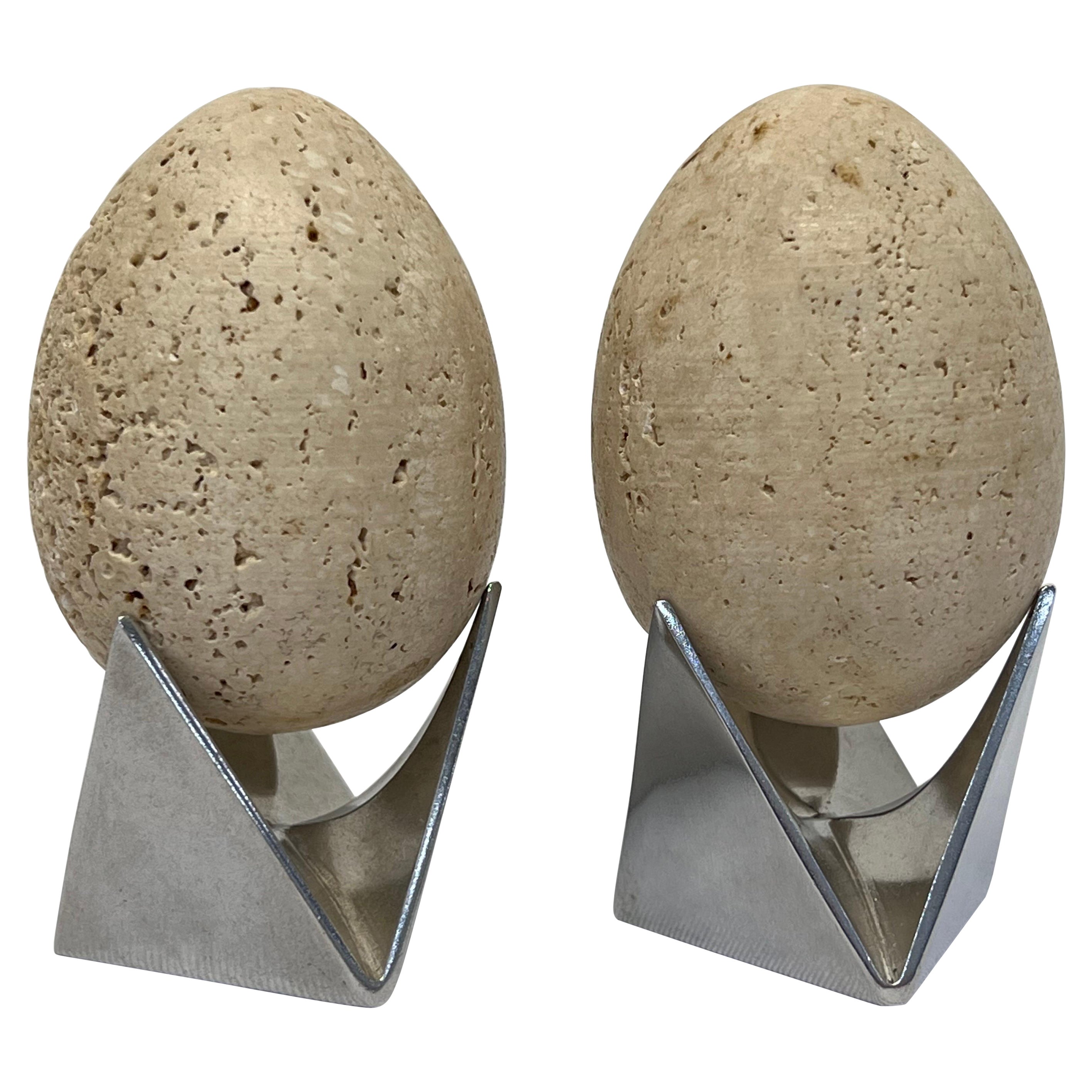 Mid-Century Travertine Egg Sculptures Atop Alessi Roost Egg Cups, a Pair For Sale