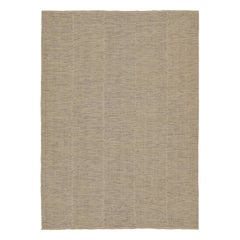 Tapis Kilim contemporain de Rug & Kilim en beige avec des accents noirs et jaunes