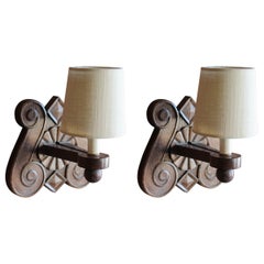 Pair of Oak Sconces in the Manner of Charles Dudouyt, France, 1940s