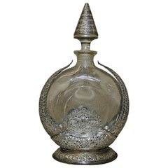 Bouteille en verre et argent du 19ème siècle signée « Guerlain ».