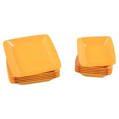 Fiskars, Finland. "Fiskamin". 12 Retro Plates in Yellow Melamine