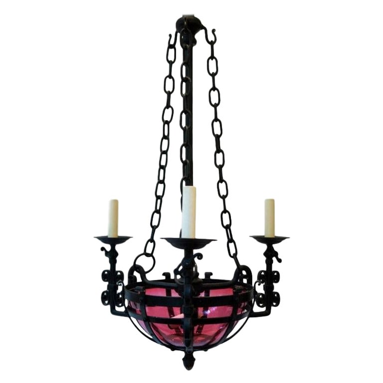 Wrought Iron Chandelier with Cranberry Glass For Sale