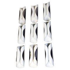 Italian Modern Set of Nine Curved Metal Sheet Wall Lamps, 1970s