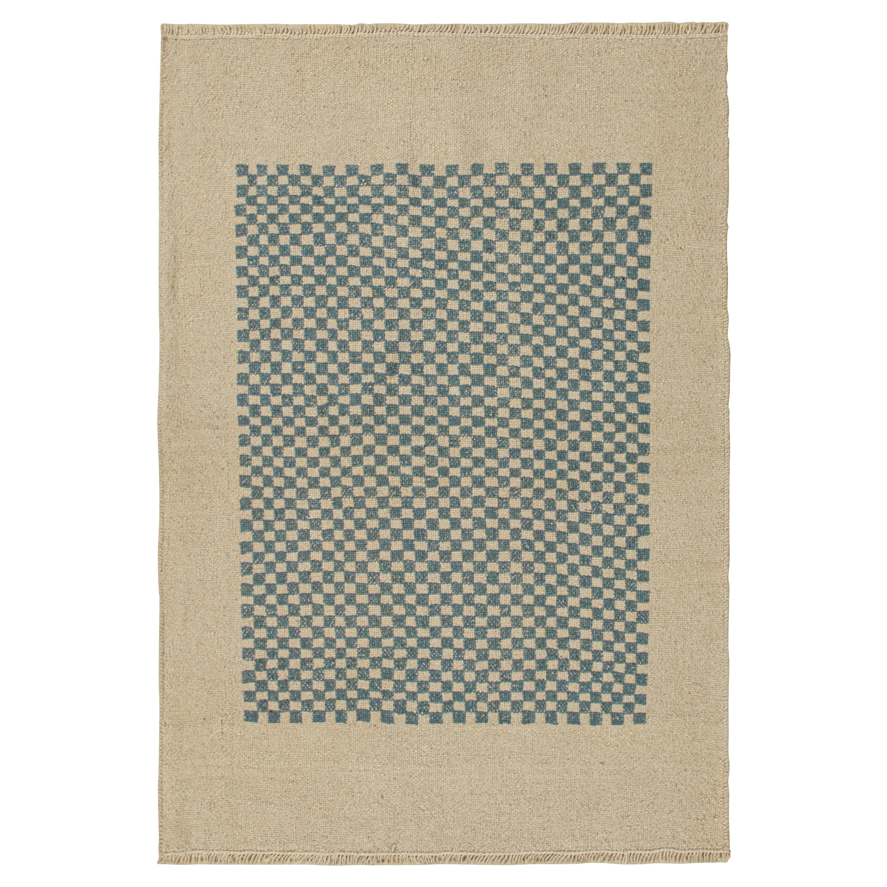 Rug & Kilim’s Sofreh-Style Persian Kilim in Beige with Blue Checkerboard Pattern For Sale