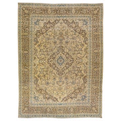 Handmade Vintage Persian Tabriz Tan Wool Rug With Medallion Design 