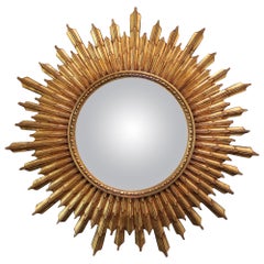 Miroir convexe en bois doré Sunburst de style Hollywood Regency