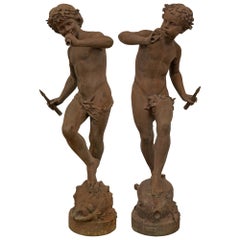 True Pair of French 19th Century Cast Iron Statues of Two Young Boys