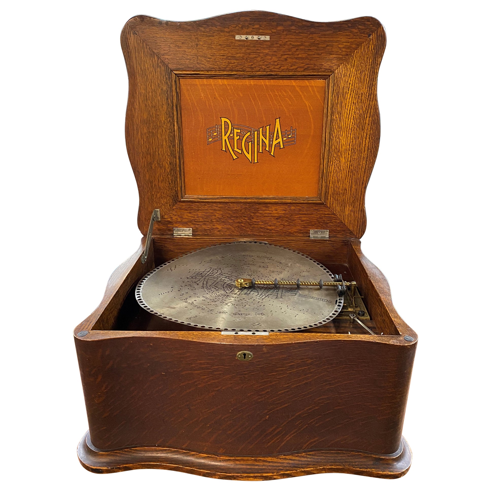 Regina Disc Music Box with Serpentine Case, circa 1899 & 10 Discs
