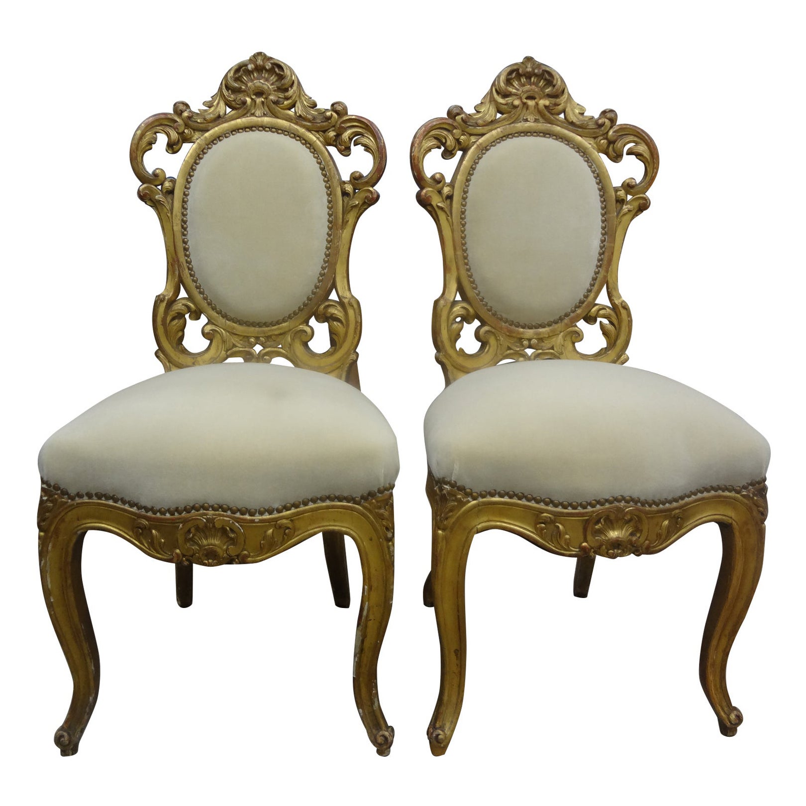 Coppia di sedie in legno dorato in stile barocco italiano